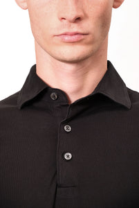 Poloshirt aus schwarzer Baumwolle 