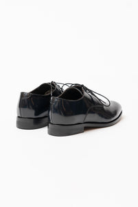 Scarpa derby in vitello spazzolato lucido nero