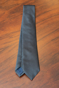 Cravatta in seta micro jaquard piquet blu petrolio